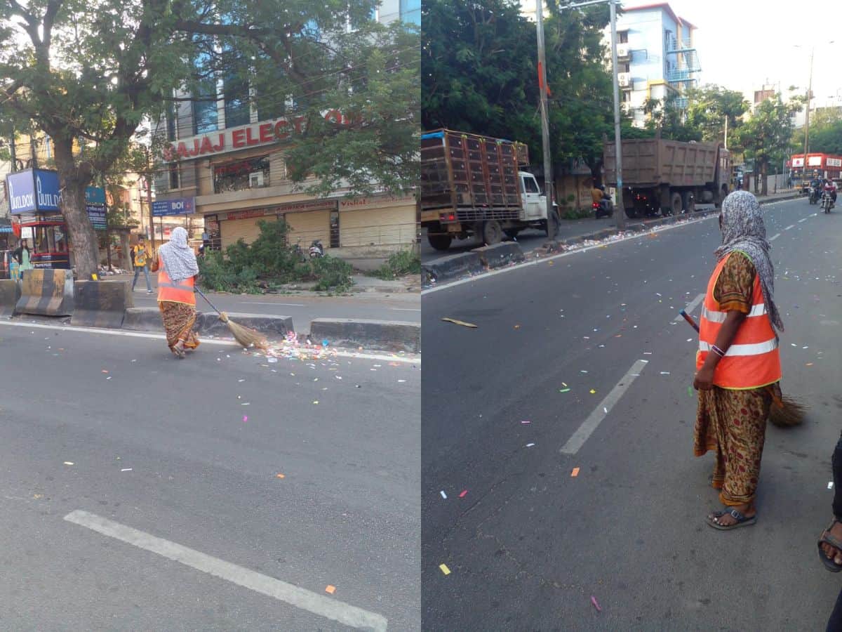 GHMC sweepers face the difficult task of clearing coloured paper strips from the city roads on Wednesday morning.