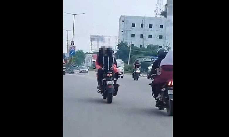 Bike stunts in Hyderabad outskirts.