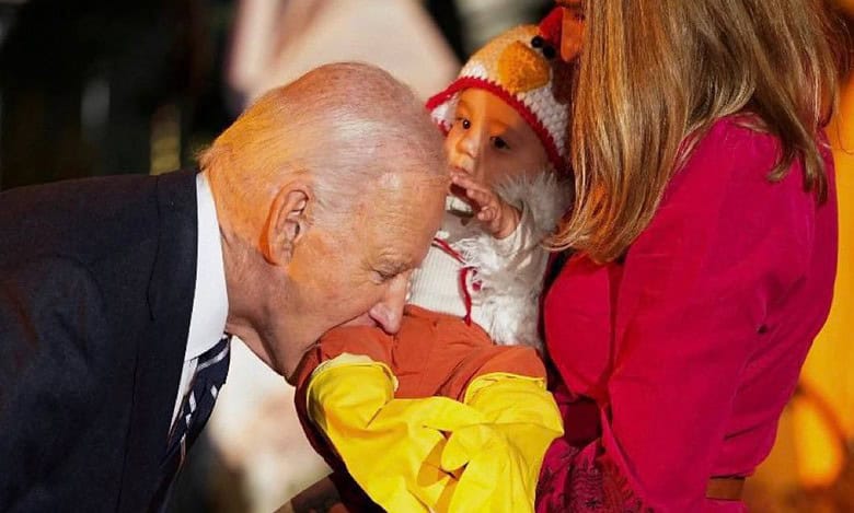 US President Joe Biden bites babies at White House
