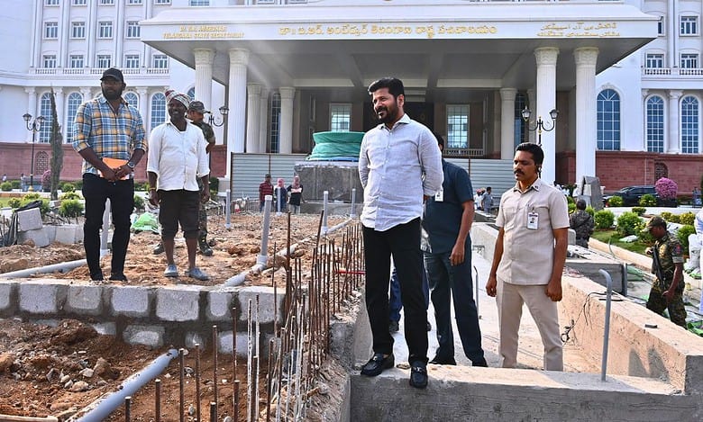 CM Revanth Reddy inspecting construction of Telangana Talli statue