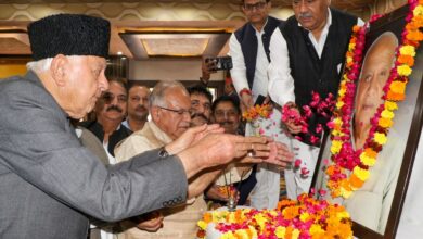 Jammu and Kashmir National Conference President Farooq Abdullah and state Congress Committee President Tariq Hameed Karra during a ceremony to pay tribute to former deputy chief minister Mangat Ram Sharma on his birth anniversary