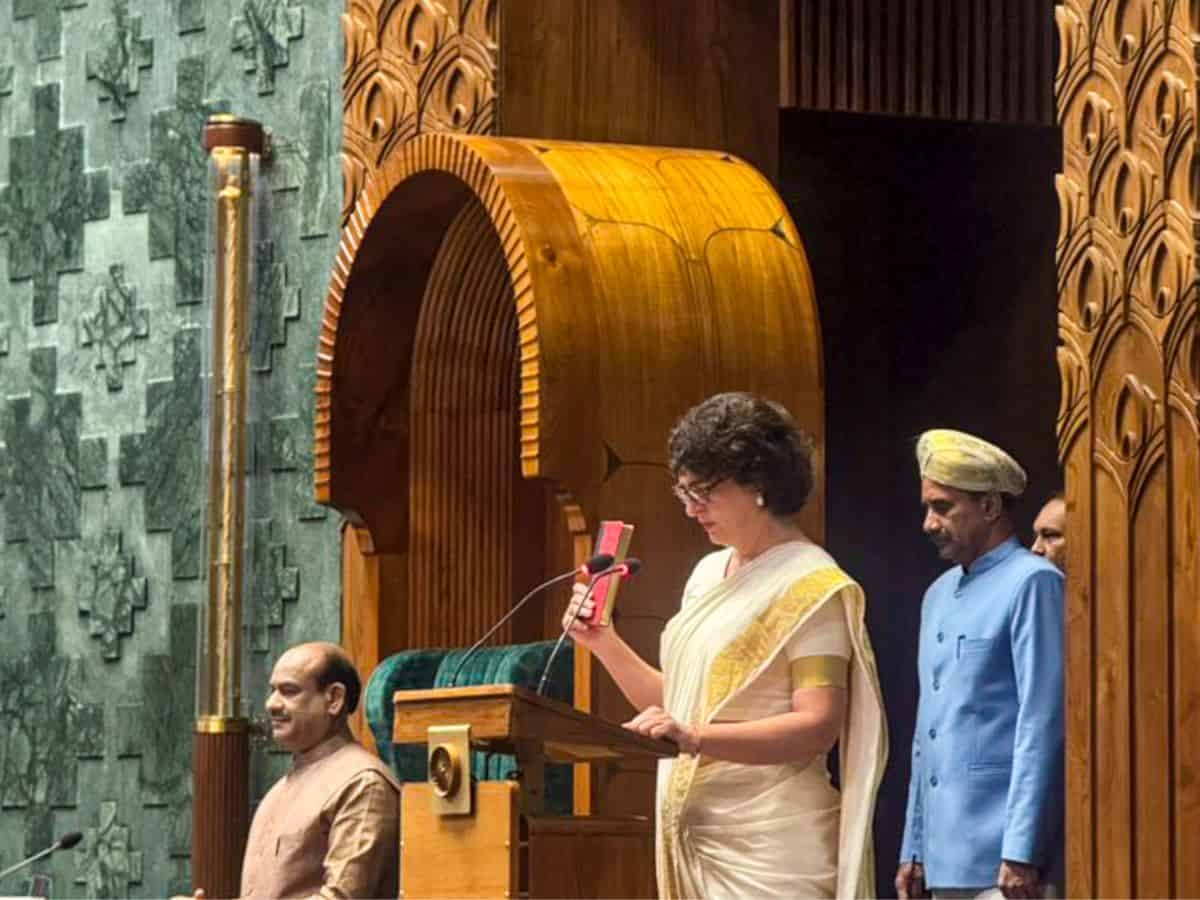 Congress leader Priyanka Gandhi Vadra takes oath as a Member of Parliament in the Lok Sabha during the Winter session of Parliament, in New Delhi