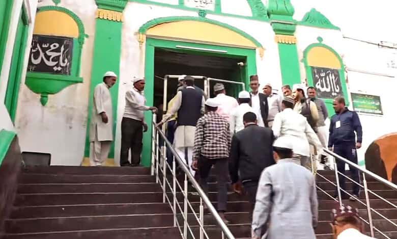 Devotees arrive at the Shahi Jama Masjid to offer prayers, in Sambhal, Friday, Nov. 29, 2024.