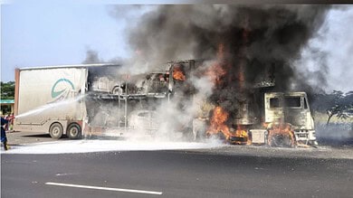Container lorry carrying 8 cars catches fire on Hyderabad-Mumbai highway