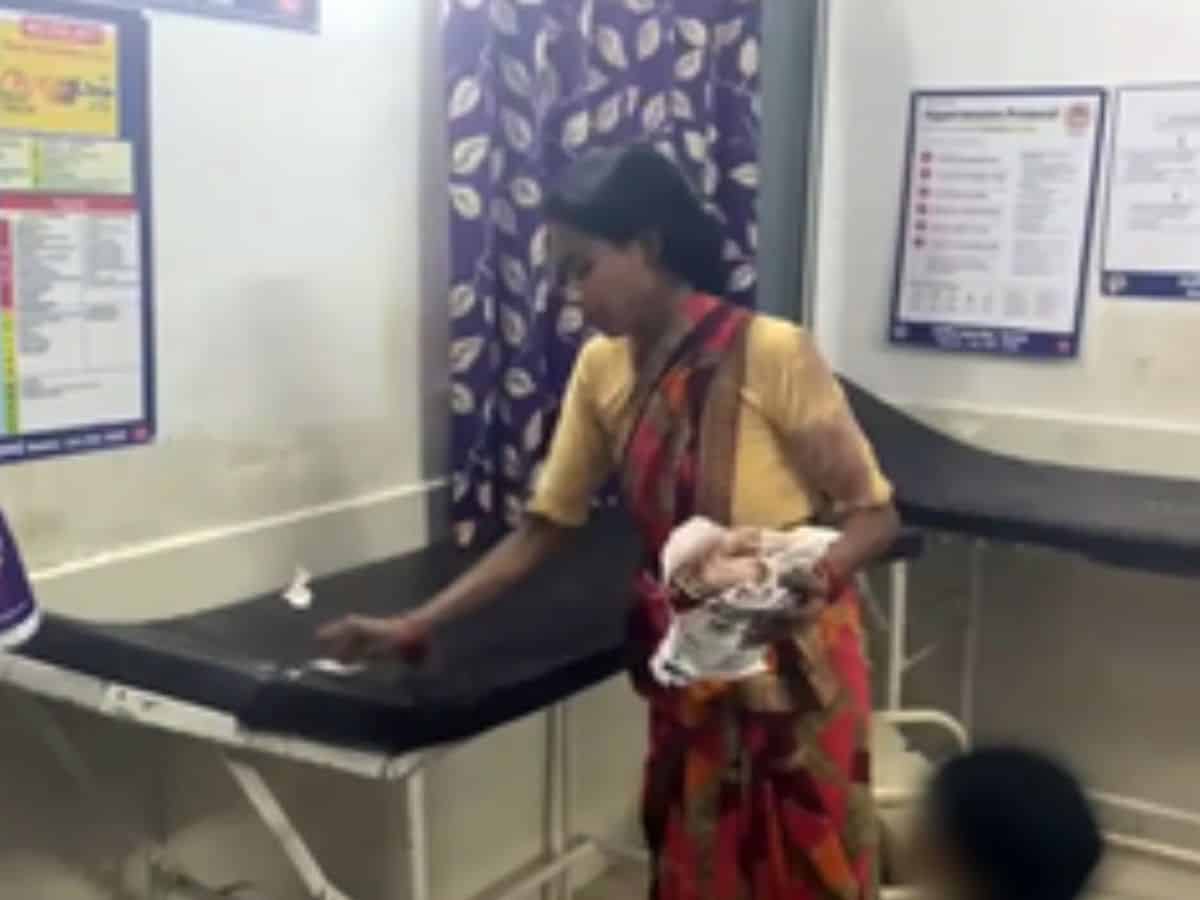 Pregnant woman cleans hospital bed where husband died