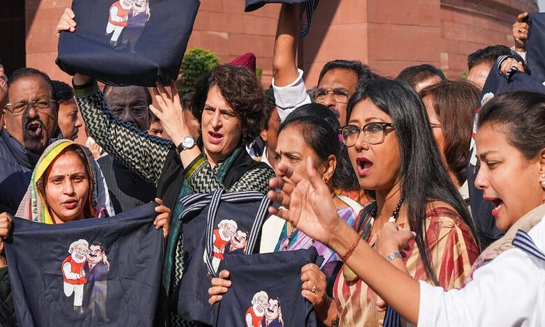 Adani Issue: Opposition MPs protest in Parliament premises with black ‘jholas’