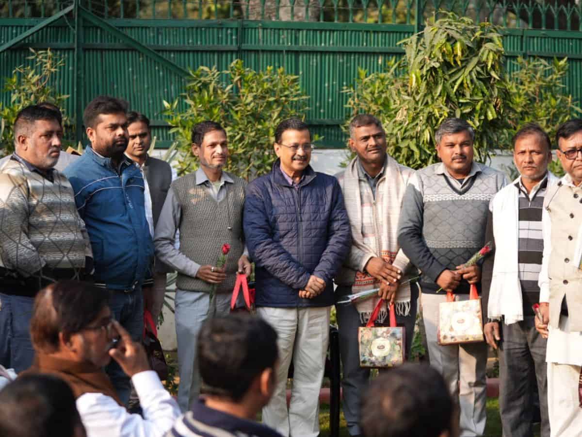 Arvind Kejriwal with auto drivers