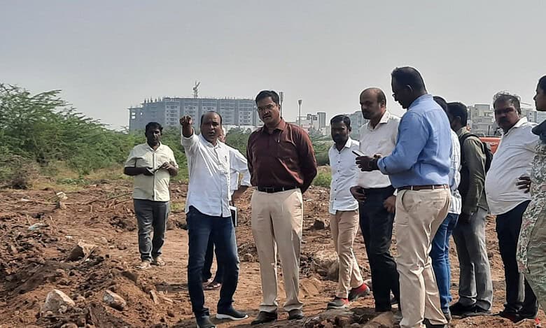 HYDRAA chief inspects lakes near Nanakramguda in Hyderabad
