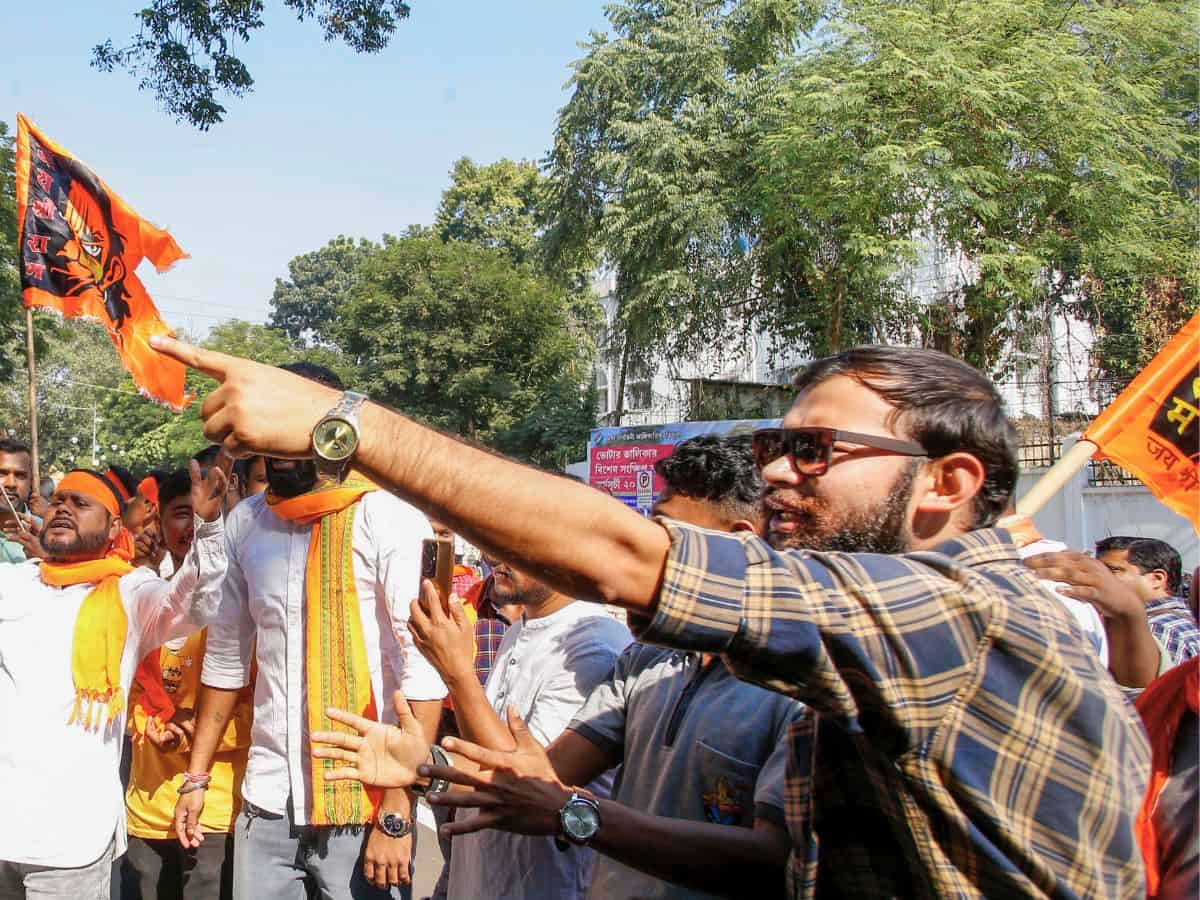 Far Right activists stage a protest over alleged atrocities on Hindus in Bangladesh, in Agartala, Monday, Dec. 2, 2024. (PTI Photo)