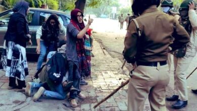 Jamia Student Ayesha Renna confronting baton-wielding police officers to save their friend from police violence in December 2019
