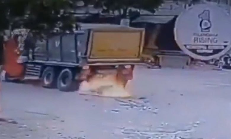 Motorbike being run over and burst into fire at Narsapur X road
