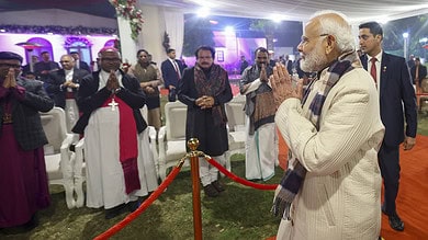 Prime Minister Narendra Modi during the Christmas celebrations at the residence of Union Minister George Kurian, in New Delhi.