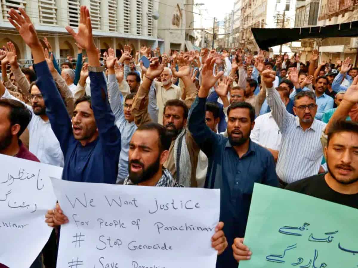 Pakistani Shia Muslim supporters of Majlis Wahdat-e-Muslimeen condemn the killings of people after gunmen opened fire on passenger vehicles in Kurram, in Karachi, Pakistan