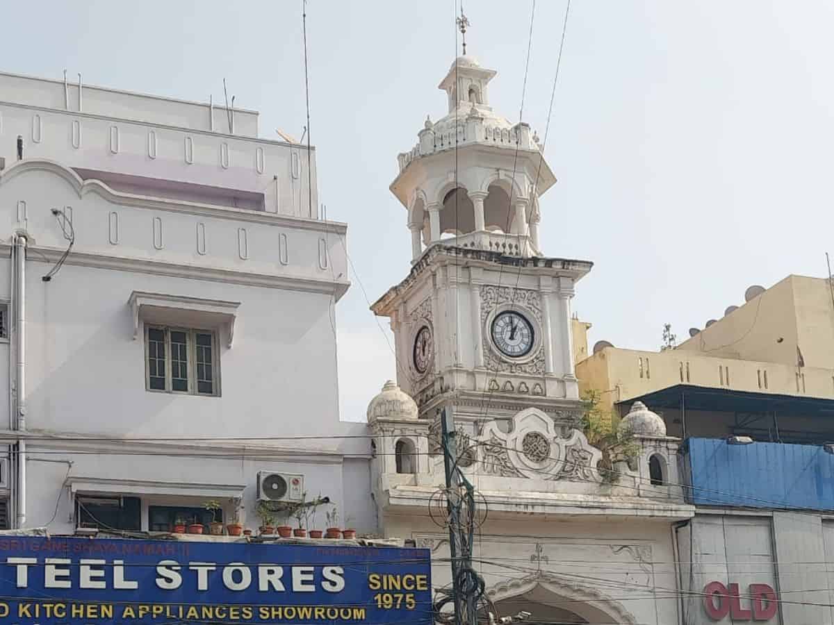Vegetation growing on Raja Rai Raiyan clock tower in Hyderabad's Shahalibanda