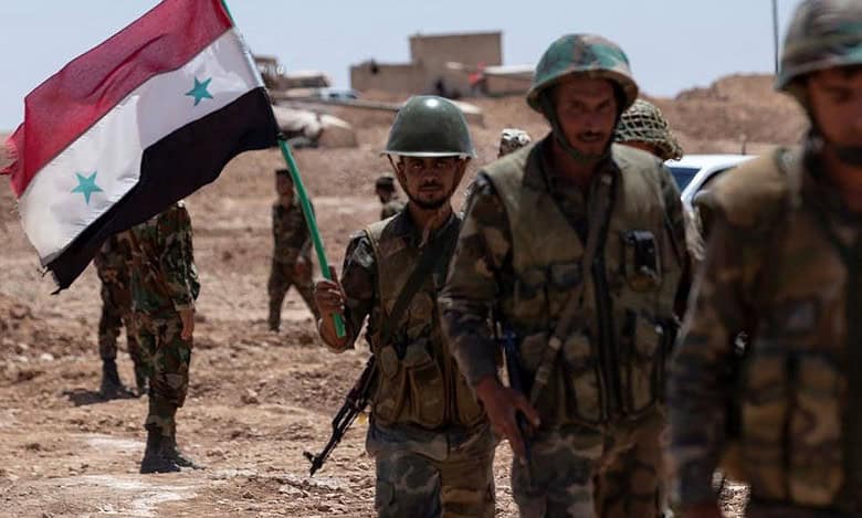 Syria's interim authorities pledge to secure safe return of soldiers fleeing to Iraq