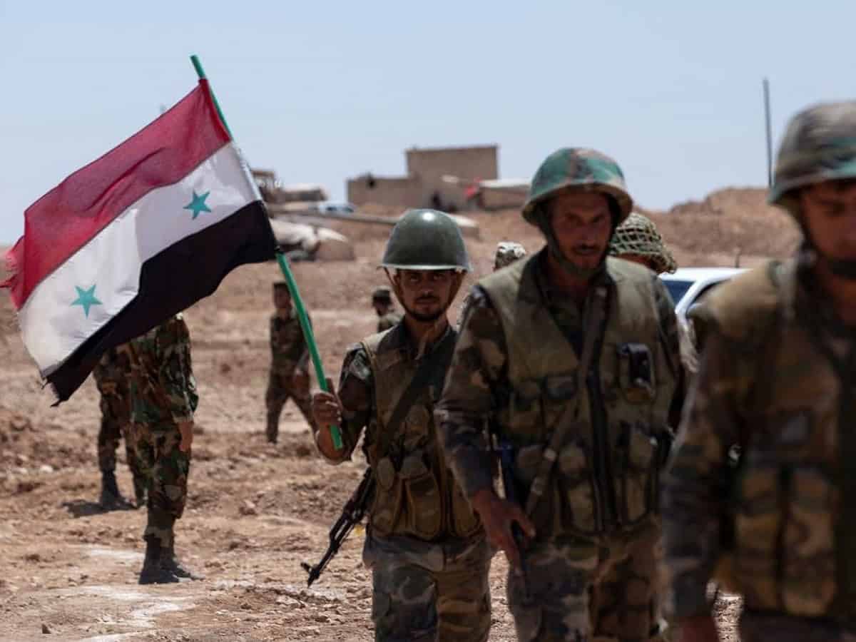 Syria's interim authorities pledge to secure safe return of soldiers fleeing to Iraq