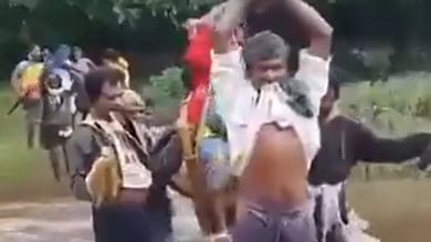 Tribals in AP carry pregnant woman in 'doli' across stream to hospital