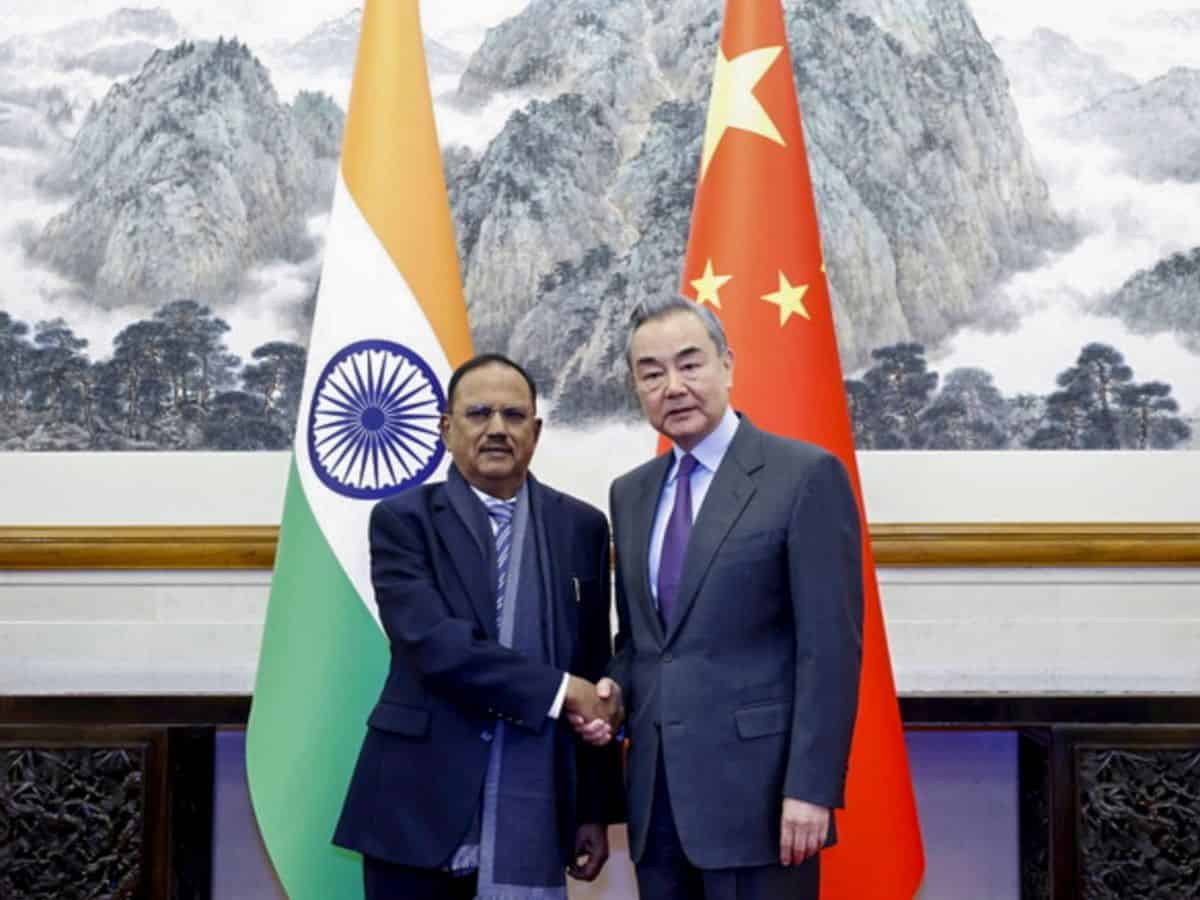 National Security Advisor Ajit Doval with Chinese Foreign Minister Wang Yi and other dignitaries during a meeting, in Beijing, China, Wednesday, Dec. 18, 2024. (PTI Photo)