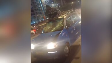 Video: Man Climbs Onto Taxi in Hit-and-Run Allegation