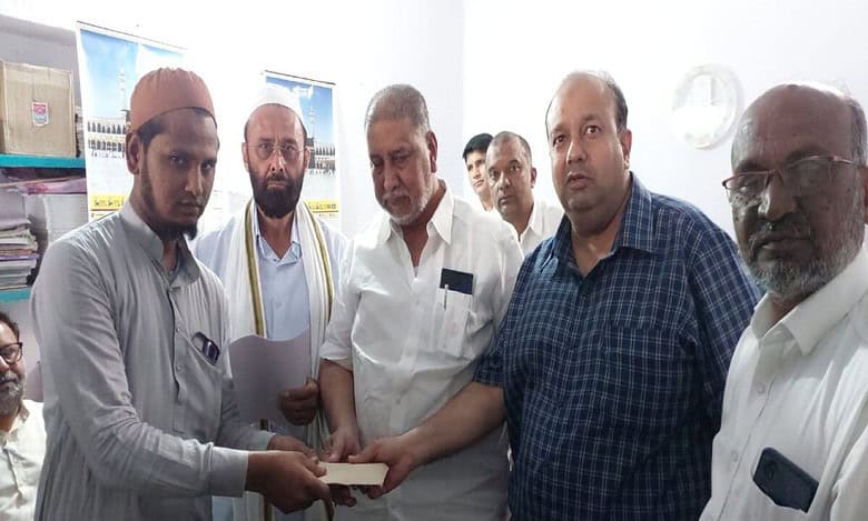 MLC Amer Ali Khan distributes financial aid to Jainur riot victims