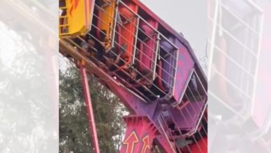 Amusement ride at Numaish in Hyderabad stuck upside down