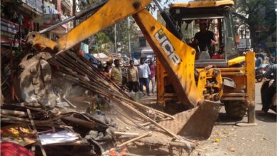 GHMC's enforcement wing demolishes vegetable, fruit and flower shops in le market on Friday, January 31.