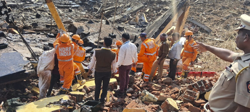 Police and rescue personnel are seen during a rescue operation after a blast at the ordnance factory, in Bhandara district, Maharashtra