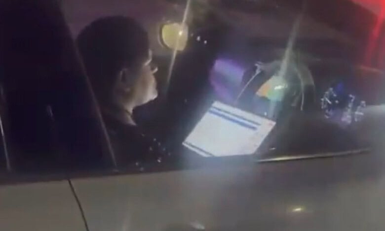 Bengaluru woman caught driving with laptop, fined for ‘work from car’