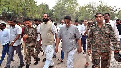 Uttam Kumar Reddy with officials at the SLBC tunnel site.