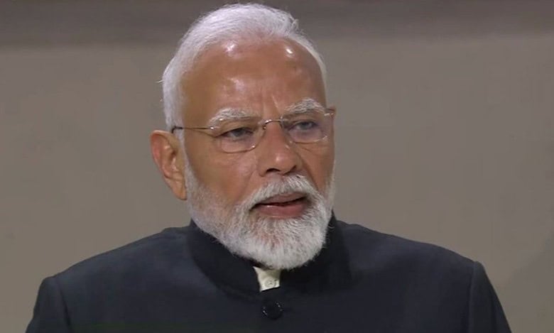Modi urges global governance at AI Summit, US opposes strict regulation