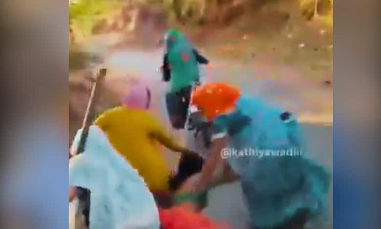 Tribal woman disrobed, dragged by motorcycle in Gujarat