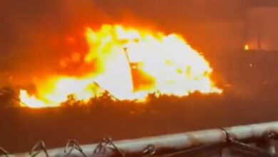Car on fire after plane crash in Philadelphia us