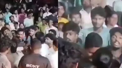 Female SI attacked during a jathara at Gudivada in AP on Tuesday night, March 11.