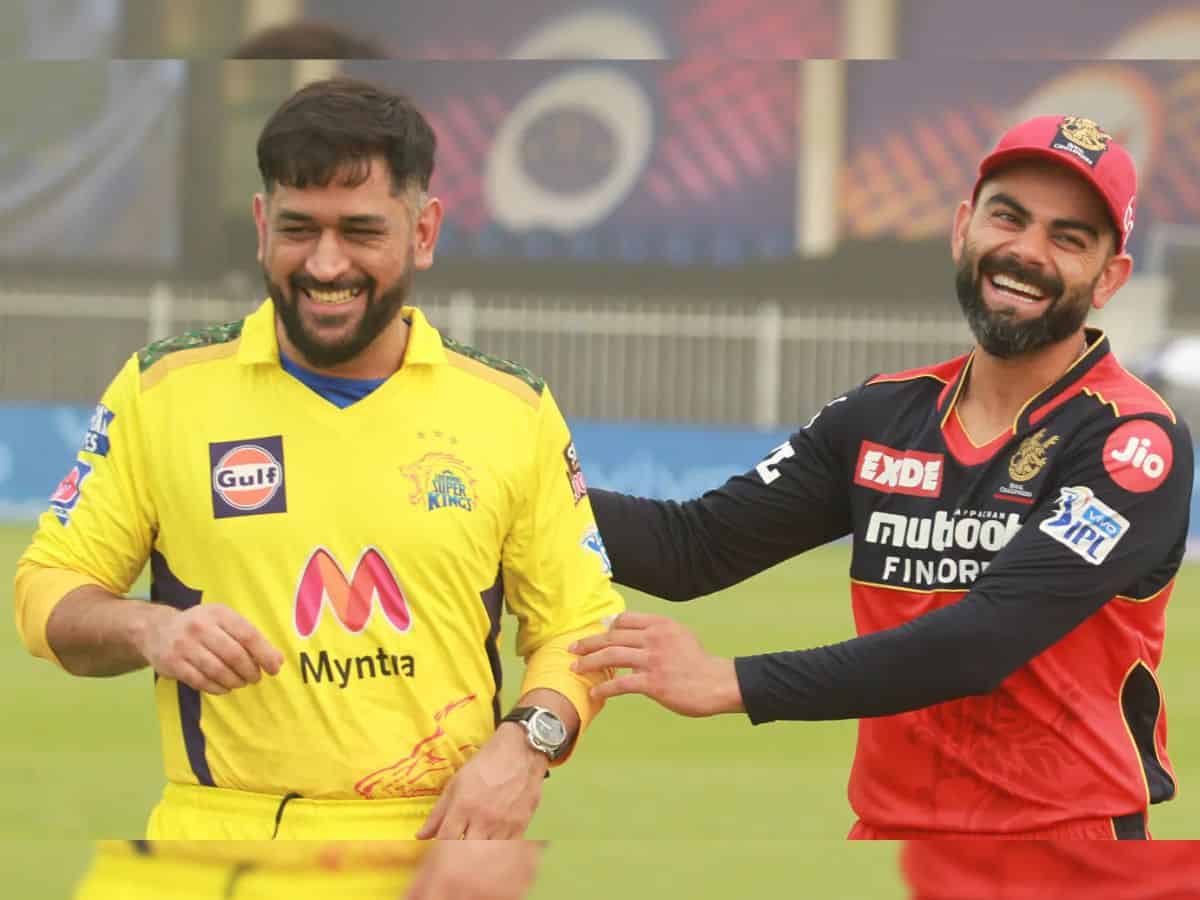 Photo of MS Dhoni wearing CSK jersey and Virat Kohli wearing RCB jersey