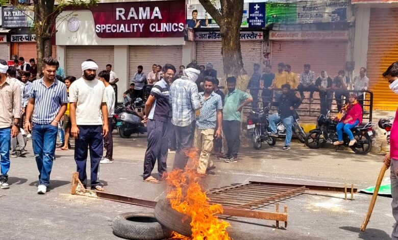 _Members of a right-wing group stage a protest over alleged vandalism at Tejaji temple