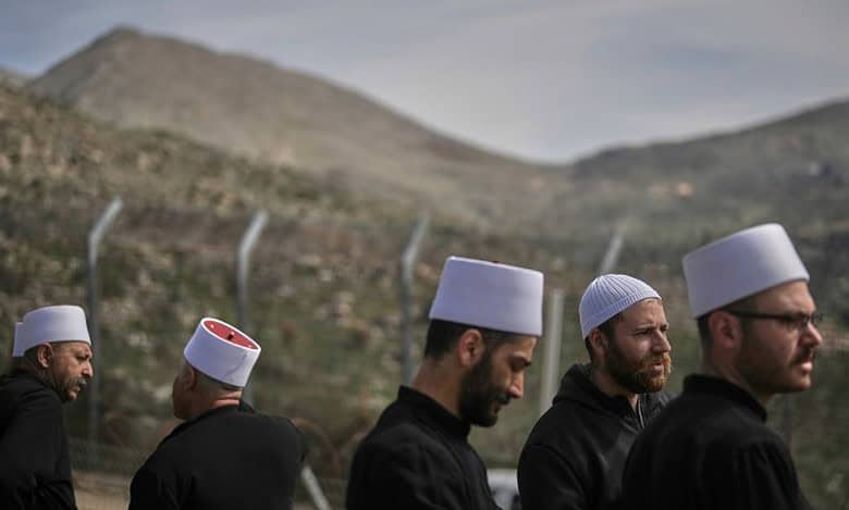 Dozens of Syrian Druze make rare visit to Israeli-controlled Golan Heights