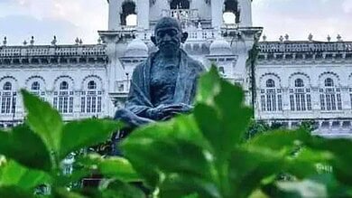 photograph of Telangana Assembly front with Mahatma Gandhi statue in focus