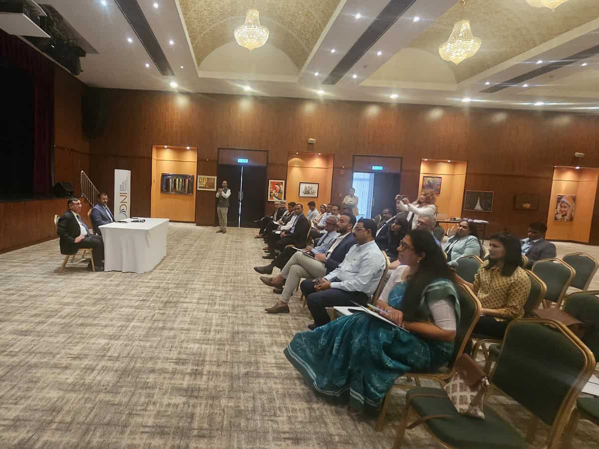 press release of journalists at the launch of new insurance plans for Indian workers in United Arab Emirates