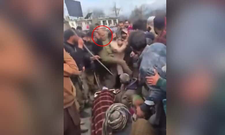 J&K cop kicks female protestor amid row over mysterious death Gujjar brothers