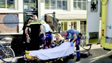 Emergency services taking the injured for medical treatement
