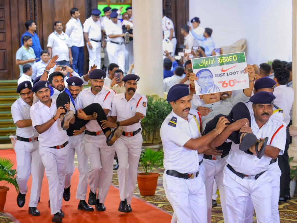 BJP MLAs being carried out by marshals