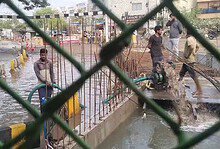 road under bridge kondapur water logging