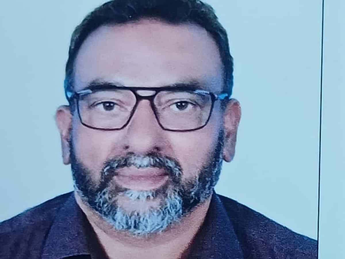 Photo of Samsudhin Hosdurg, Indian expat and Big Ticket Abu Dhabi winner, wearing glasses and a dark shirt.