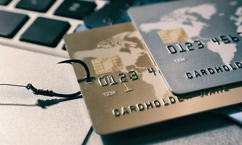 Representational Image of hooked attacked to credit cards