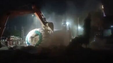 A video has surfaced online showing the bulldozer as it brings down the dome of the dargah at night.