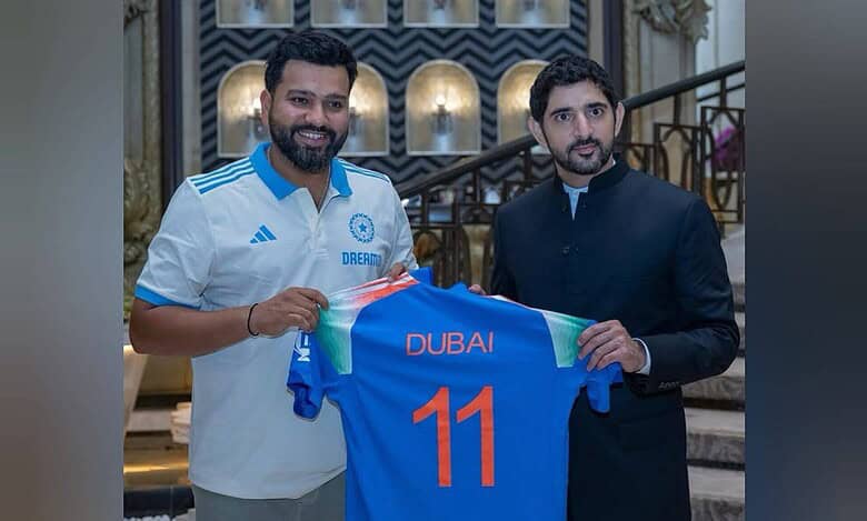 A photo shows Rohit Sharma presenting customised Team India jersey to Dubai Crown Prince Sheikh Hamdan during official visit to India.