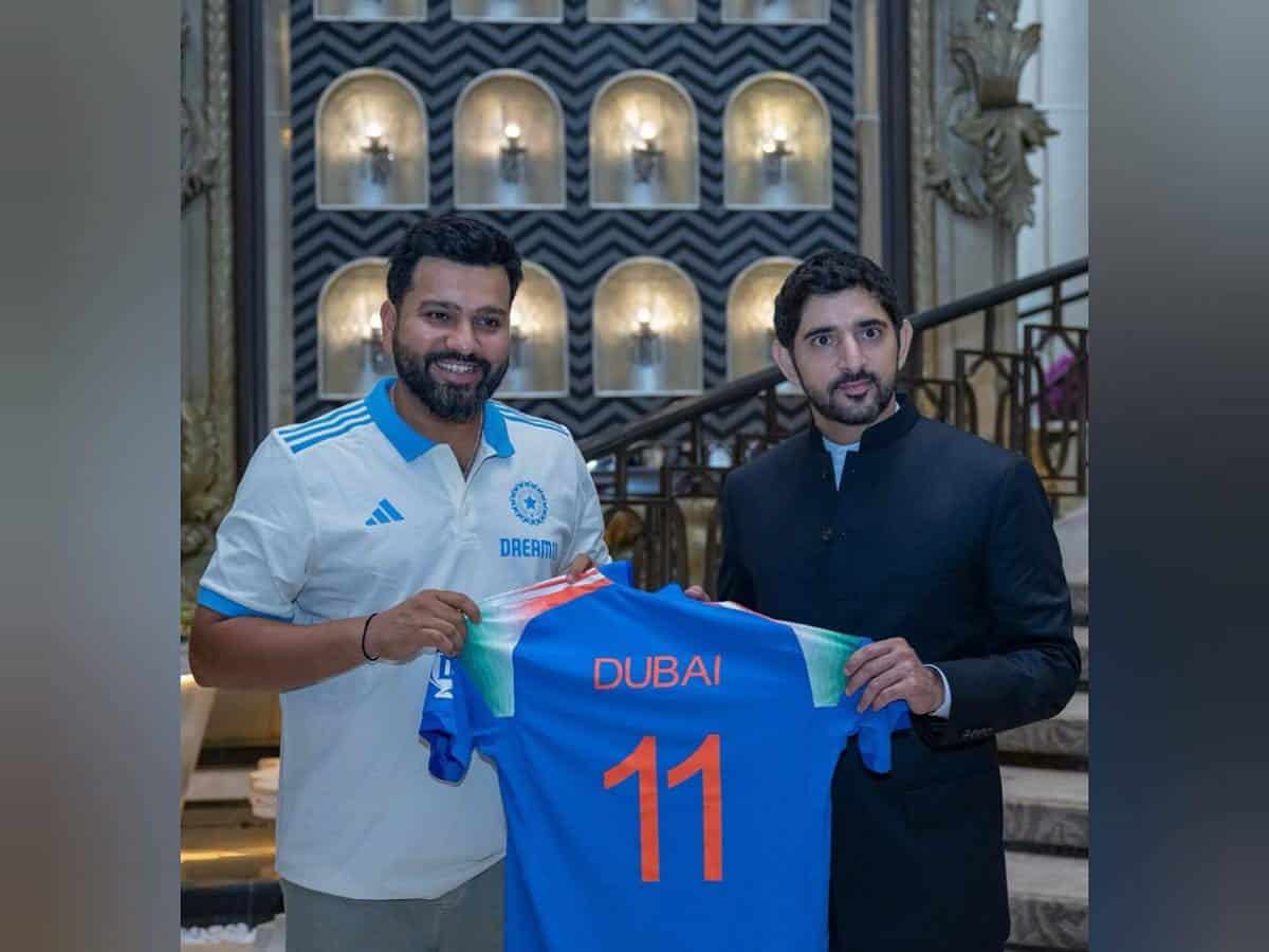 A photo shows Rohit Sharma presenting customised Team India jersey to Dubai Crown Prince Sheikh Hamdan during official visit to India.