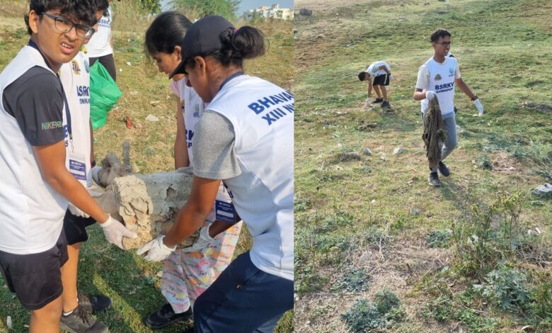 The image shows the students of Bhavans Sri Ramakrishna Vidyalaya (BSRKV) holding a clean-up drive at the Kapra Lake in Sainikpuri on Tuesday, April 29.