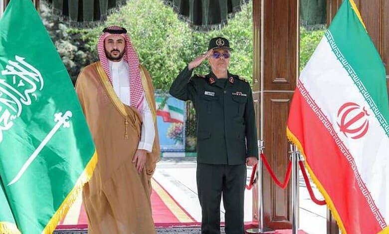 Saudi Defence Minister Prince Khalid bin Salman stands beside Iran’s Armed Forces Chief of Staff Major-General Mohammad Bagheri during an official welcome ceremony in Tehran.
