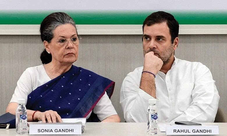Sonia Gandhi and Rahul Gandhi in conversation at Congress meet.